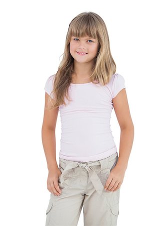 simsearch:400-06885115,k - Little girl smiling at camera on white background Photographie de stock - Aubaine LD & Abonnement, Code: 400-06885037