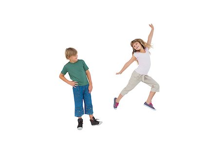 simsearch:400-06885115,k - Happy little boy and girl jumping on white background Photographie de stock - Aubaine LD & Abonnement, Code: 400-06885050