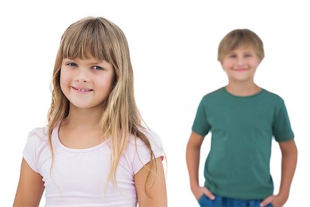 simsearch:400-06885115,k - Girl smiling with boy behind her on white background Photographie de stock - Aubaine LD & Abonnement, Code: 400-06885051