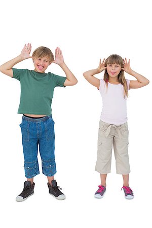 preteen girls tongue - Funny children being silly on white background Stock Photo - Budget Royalty-Free & Subscription, Code: 400-06885061