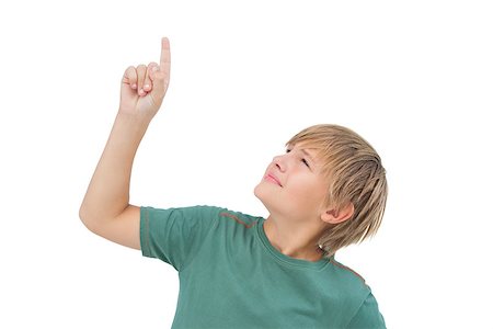 preteens fingering - Boy raising his finger and looking up on white background Stock Photo - Budget Royalty-Free & Subscription, Code: 400-06885070