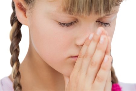 photos of little girl praying - Little blonde girl praying on white background Stock Photo - Budget Royalty-Free & Subscription, Code: 400-06885106