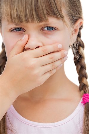 Portrait of a little blond girl with her hand on her mouth on white background Stock Photo - Budget Royalty-Free & Subscription, Code: 400-06885101