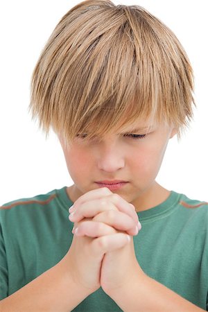 simsearch:400-06885104,k - Little boy saying his prayers on white background Stock Photo - Budget Royalty-Free & Subscription, Code: 400-06885131