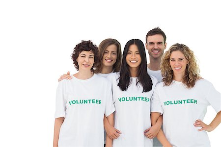 simsearch:400-07273325,k - Smiling group of volunteers standing on white background Foto de stock - Royalty-Free Super Valor e Assinatura, Número: 400-06885198