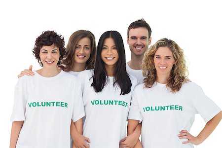 simsearch:400-07273325,k - Group of people wearing volunteer tshirt on white background Foto de stock - Royalty-Free Super Valor e Assinatura, Número: 400-06885199