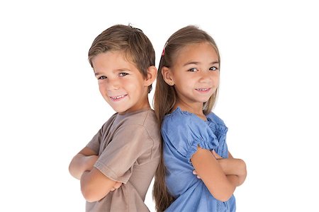 Children standing back to back with arms crossed on white background Stock Photo - Budget Royalty-Free & Subscription, Code: 400-06885743