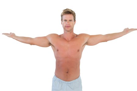 simsearch:400-06885881,k - Shirtless man opening his arms on white background Photographie de stock - Aubaine LD & Abonnement, Code: 400-06885853