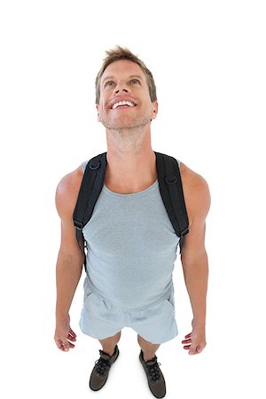 simsearch:400-06885881,k - Smiling man in sportswear on white background Photographie de stock - Aubaine LD & Abonnement, Code: 400-06885879