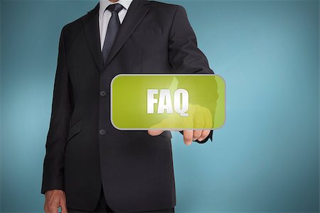 simsearch:400-06886821,k - Businessman touching green tag with the word faq written on it on blue background Photographie de stock - Aubaine LD & Abonnement, Code: 400-06885934