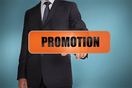 simsearch:400-06886821,k - Businessman touching the word promotion written on tag on blue background Photographie de stock - Aubaine LD & Abonnement, Code: 400-06885969