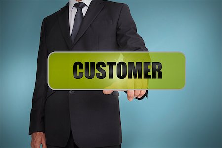 simsearch:400-06886798,k - Businessman touching the word customer written on green tag on blue background Stock Photo - Budget Royalty-Free & Subscription, Code: 400-06885977