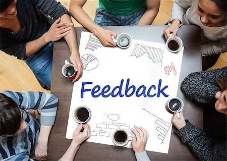 Feedback written on a poster with drawings of charts during a brainstorm Stock Photo - Budget Royalty-Free & Subscription, Code: 400-06886064