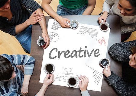 Creative written on a poster with drawings of charts during a brainstorm Stock Photo - Budget Royalty-Free & Subscription, Code: 400-06886065