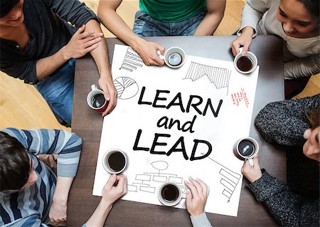 Learn and lead written on a poster with drawings of charts during a brainstorm Stock Photo - Budget Royalty-Free & Subscription, Code: 400-06886069