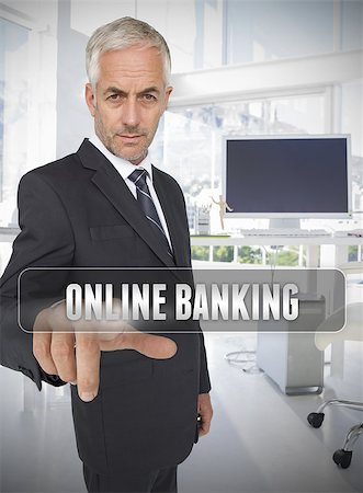 simsearch:6109-07601580,k - Businessman touching the term online banking in his office Stockbilder - Microstock & Abonnement, Bildnummer: 400-06886799