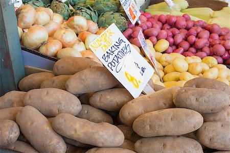 Baking Potatoes Onions Artichokes Vegetables Stall Display with Signs at Farmers Market Stock Photo - Budget Royalty-Free & Subscription, Code: 400-06887231