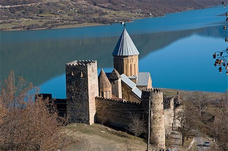 simsearch:400-06638923,k - Ananuri castle complex is situated on Zhinvali Reservoir in Georgia. This is good combination of ancient architecture and rich landscape. Photographie de stock - Aubaine LD & Abonnement, Code: 400-06887354