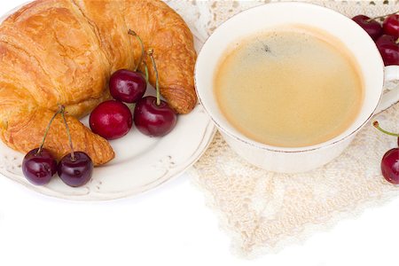 breakfast with fresh coffee, fresh croissants and  chery berries Fotografie stock - Microstock e Abbonamento, Codice: 400-06887376