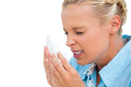 simsearch:400-06868935,k - Ill woman sneezing into tissue on white background Foto de stock - Super Valor sin royalties y Suscripción, Código: 400-06888942