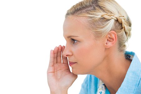 simsearch:400-06888942,k - Close up of a beautiful blonde about to speak on white background Photographie de stock - Aubaine LD & Abonnement, Code: 400-06888972