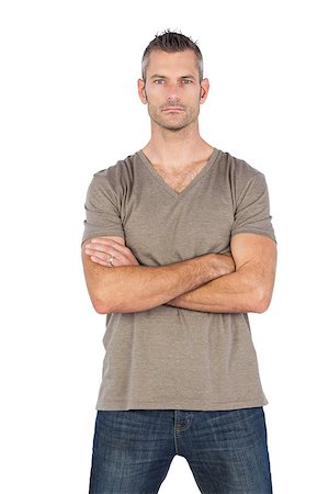 simsearch:400-07778671,k - Serious man with arms crossed looking at the camera Fotografie stock - Microstock e Abbonamento, Codice: 400-06889027