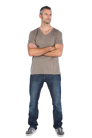 A man standing with arms crossed on a white background Stock Photo - Budget Royalty-Free & Subscription, Code: 400-06889032