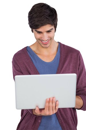 simsearch:400-06889146,k - Smiling man using a laptop on a white background Foto de stock - Super Valor sin royalties y Suscripción, Código: 400-06889084