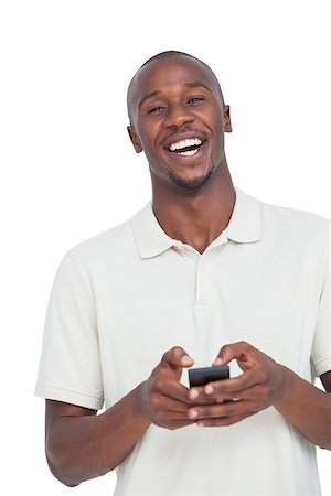 Laughing man with mobile phone on a white background Stock Photo - Budget Royalty-Free & Subscription, Code: 400-06889360