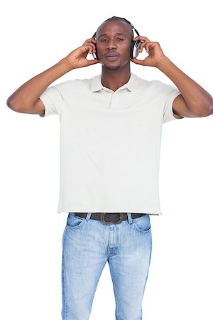 simsearch:400-06889355,k - Man listening to music with hands on his headphones on a white background Stockbilder - Microstock & Abonnement, Bildnummer: 400-06889370