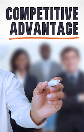 Businessman underlining the word competitive advantage in front of a business team Stock Photo - Budget Royalty-Free & Subscription, Code: 400-06889618