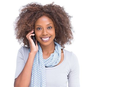 scarf curly woman - Smiling woman on the phone on white background Stock Photo - Budget Royalty-Free & Subscription, Code: 400-06880022