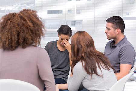 Patient crying during group therapy session Stock Photo - Budget Royalty-Free & Subscription, Code: 400-06880070