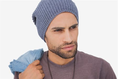 Stylish young man looking away on white background Stock Photo - Budget Royalty-Free & Subscription, Code: 400-06880458