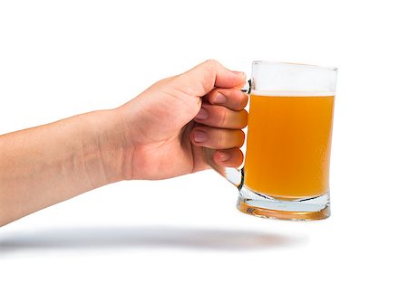 simsearch:400-04705447,k - Hand holding bottle of beer and beer mug. White isolated studio shot. Stock Photo - Budget Royalty-Free & Subscription, Code: 400-06880919