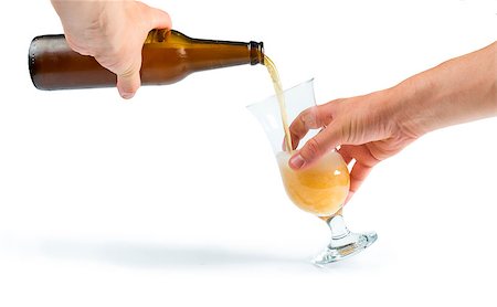 simsearch:400-04705447,k - Hand holding bottle of beer and beer mug. White isolated studio shot. Stock Photo - Budget Royalty-Free & Subscription, Code: 400-06880946