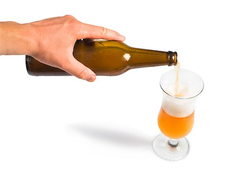 simsearch:400-07828997,k - Hand holding bottle of beer and beer mug. White isolated studio shot. Stock Photo - Budget Royalty-Free & Subscription, Code: 400-06880949