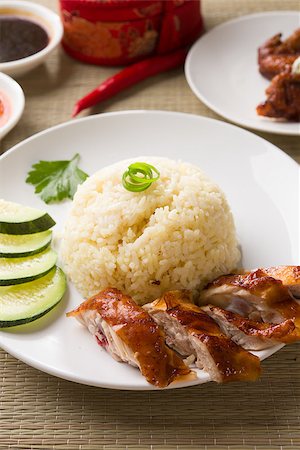 southern asian food - singapore roasted chicken rice  with chili sauce as background Photographie de stock - Aubaine LD & Abonnement, Code: 400-06881304