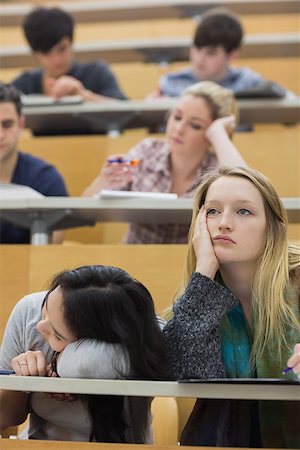 Students feeling bored in a lecture hall in college Stock Photo - Budget Royalty-Free & Subscription, Code: 400-06881958