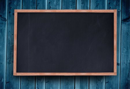 Blackboard with copy space on blue wooden board background Stock Photo - Budget Royalty-Free & Subscription, Code: 400-06882245