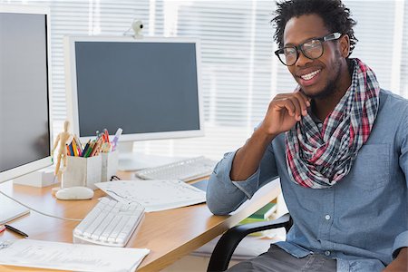 Portrait of a cheering creative business employee in a modern office Stock Photo - Budget Royalty-Free & Subscription, Code: 400-06883010