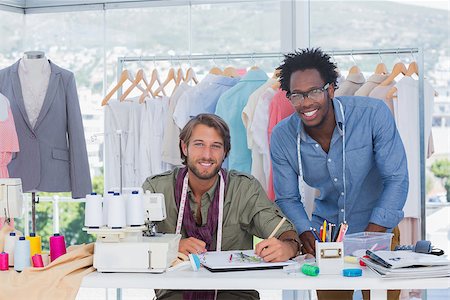 simsearch:400-06885526,k - Attractive fashion designers working together in a bright office Stock Photo - Budget Royalty-Free & Subscription, Code: 400-06883162