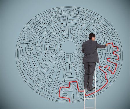 Businessman on ladder drawing red line to solve a maze on grey wall Stock Photo - Budget Royalty-Free & Subscription, Code: 400-06883315