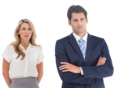 simsearch:400-06879270,k - Businesswoman looking at a businessman with crossed arms Stock Photo - Budget Royalty-Free & Subscription, Code: 400-06883361