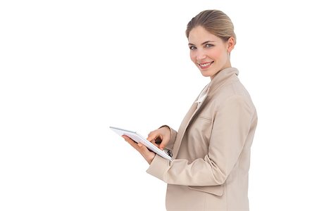 simsearch:400-06802290,k - Smiling businesswoman holding tablet pc Stock Photo - Budget Royalty-Free & Subscription, Code: 400-06883393
