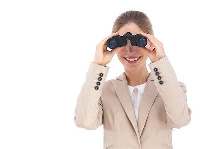 simsearch:400-06883455,k - Businesswoman holding binoculars and looking at the camera Photographie de stock - Aubaine LD & Abonnement, Code: 400-06883406