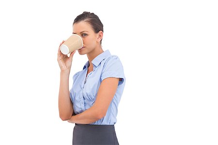 simsearch:400-06883455,k - Businesswoman drinking cup of coffee and looking at the camera Photographie de stock - Aubaine LD & Abonnement, Code: 400-06883444