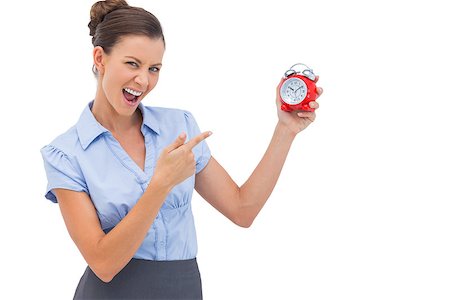 simsearch:400-06883455,k - Businesswoman pointing at alarm clock with finger Photographie de stock - Aubaine LD & Abonnement, Code: 400-06883493