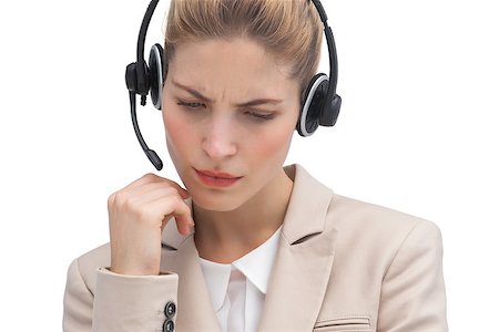 Worried call center agent with headset Stock Photo - Budget Royalty-Free & Subscription, Code: 400-06883620