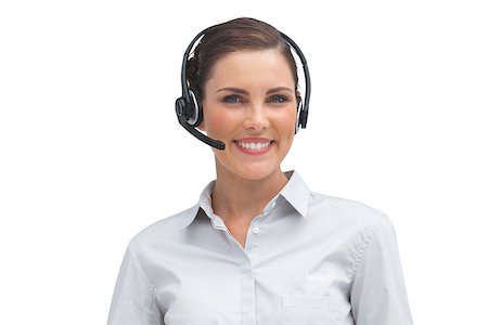 simsearch:400-06883455,k - Smiling businesswoman with headset looking a the camera Photographie de stock - Aubaine LD & Abonnement, Code: 400-06883655